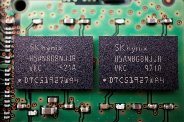 Memory chips made by South Korean semiconductor company SK Hynix are seen on a computer circuit board on February 25, 2022. Photo: Reuters