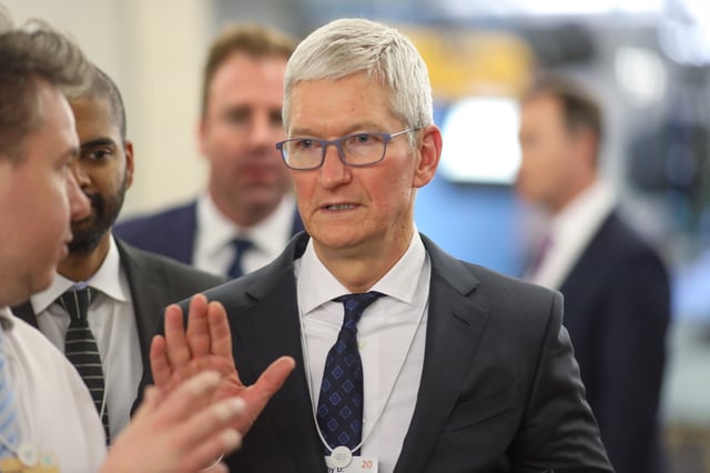 Tim Cook, chief executive officer of Apple Inc., walks between sessions on day two of the World Economic Forum (WEF) in Davos, Switzerland, on Wednesday, Jan. 22, 2020. World leaders, influential executives, bankers and policy makers attend the 50th annual meeting of the World Economic Forum in Davos from Jan. 21 - 24. Photographer: Simon Dawson/Bloomberg via Getty Images