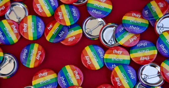 Free pronoun buttons at the AISD "Pride Out!" Party in the Park event at Eastside Early College High School in Austin on Saturday, Mar. 26, 2022. There were fill-in-the-blank and other options not pictured as well.