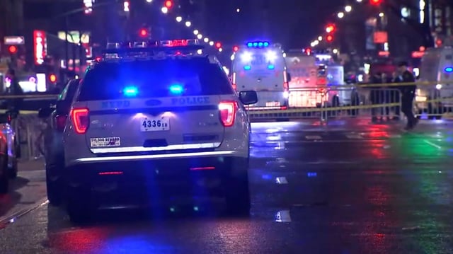 Police on the scene of a machete attack near New York's Times Square on December 31, 2022.