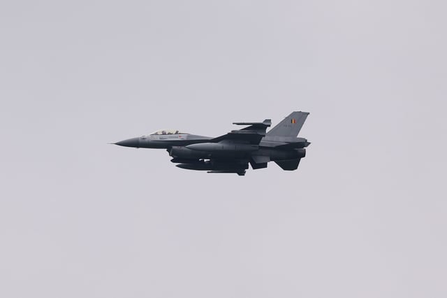 A F-16 flies over Belgium