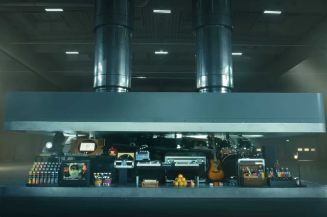 A hydraulic press crushes an array of creative instruments in an Apple ad that has been pulled from television.