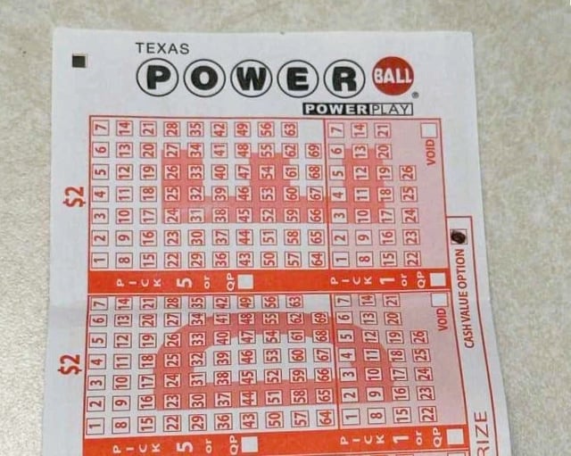 Powerball players buy their tickets for the Saturday, May 11 drawing worth an estimated $36 million.
