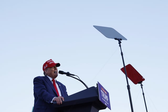Donald Trump speaking at rally.