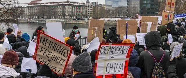 BERLIN, GERMANY - DECEMBER 03: Demonstrators protest in front of the Chinese Embassy in solidarity with protesters in China on December 3, 2022 in Berlin, Germany. Protests have been occurring in cities across China recently over the country's ongoing intense Covid lockdowns. A common feature has included protesters holding up blank sheets of A4 paper to symbolize China's heavy-handed enforcement against free speech. (Photo by Omer Messinger/Getty Images)