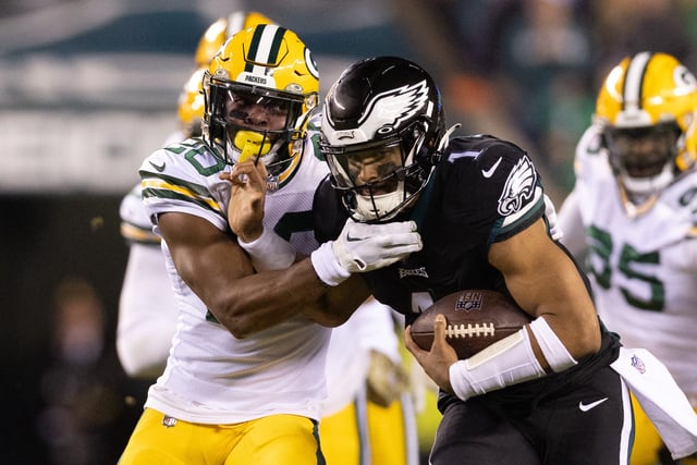 Philadelphia Eagles quarterback Jalen Hurts (1) runs with the ball against Green Bay Packers safety Rudy Ford (20) during the second quarter at Lincoln Financial Field.