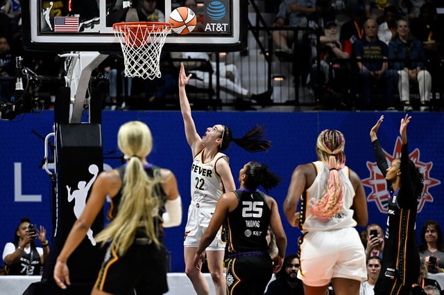 Indiana Fever guard Caitlin Clark scores her first WNBA regular season basket against during a game against the Connecticut Sun in Uncasville, Connecticut on Tuesday, May 14, 2024.