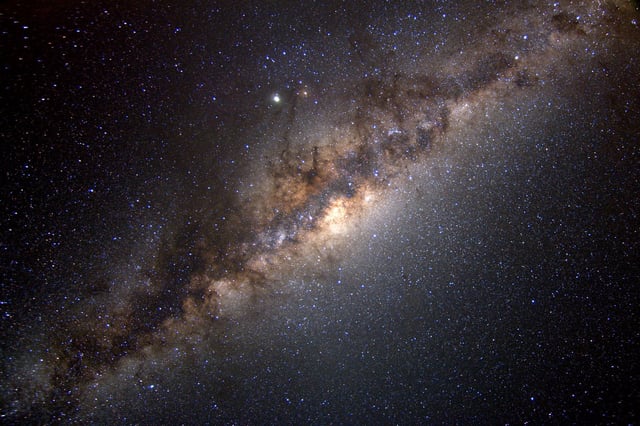 MIT astronomers discovered three of the oldest stars in the universe, and they live in our own galactic neighborhood. The stars are in the Milky Way’s “halo” — the cloud of stars that envelopes the main galactic disk — and they appear to have formed between 12 and 13 billion years ago, when the very first galaxies were taking shape. Credits:Image: Serge Brunier; NASA