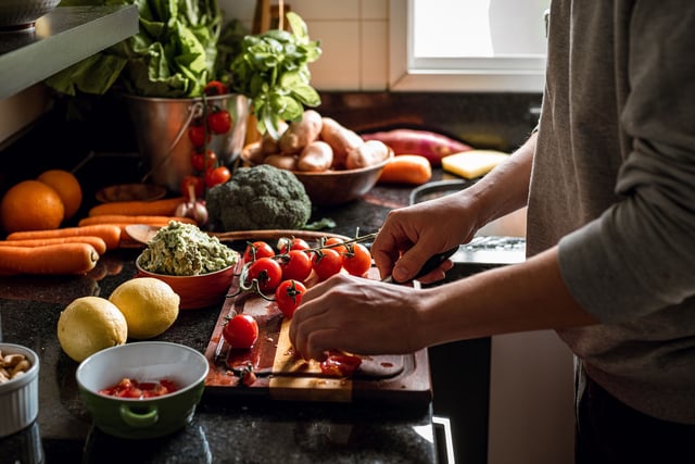 Shot of a vegan meal preparation with lots of vegetables and fruits on a domestic kitchen
