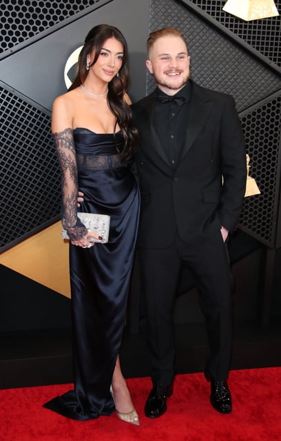 Barstool personality Brianna LaPaglia says she and her boyfriend, country singer Zach Bryan, were in a "side-by-side" car crash.