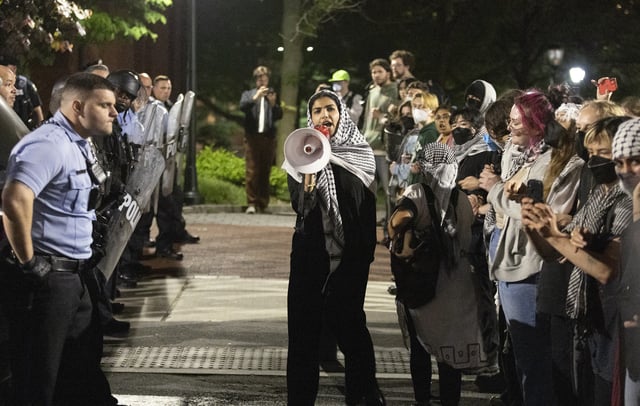 Pro-Palestinian protesters and Philadelphia police have a standoff along 34th Street at the University of Pennsylvania on Friday, May 17, 2024. 