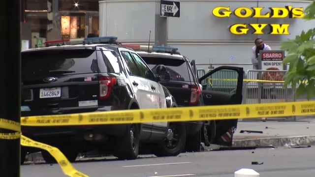 A man stole and crashed a police SUV with an officer inside Sunday in downtown Los Angeles.