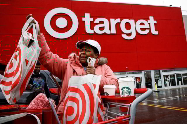 Shoppers exit a Target store during in New York City in 2021.  