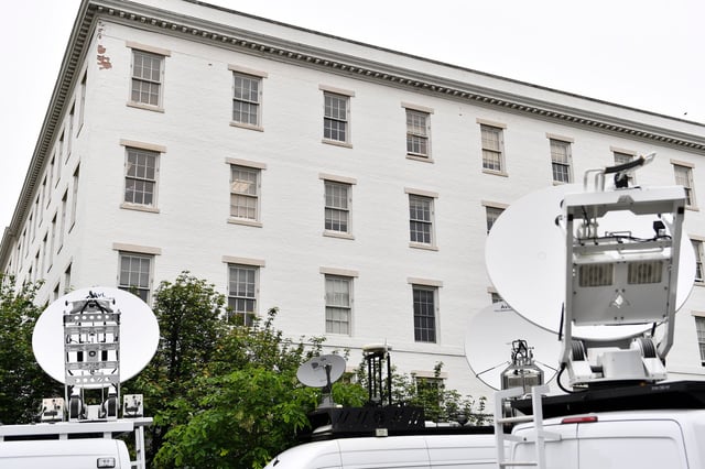 This 2016 photo shows media trucks outside the Republican National Committee headquarters in Washington, DC.