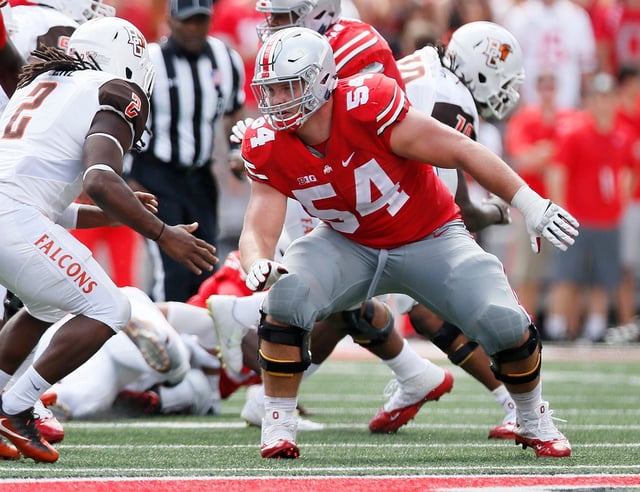 Ohio State Buckeyes offensive lineman Billy Price (54) blocks Bowling Green Falcons linebacker Trenton Greene (2) during the NCAA football game at Ohio Stadium on Sept. 3, 2016. Ohio State won 77-10. (Adam Cairns / The Columbus Dispatch)