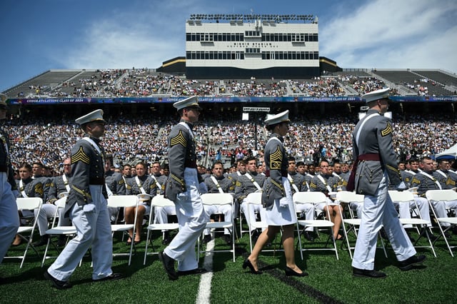 US Military Academy cadets walk to receive their diplomas after President Joe Biden delivered the commencement address at the 2024 graduation ceremony in West Point, New York, on May 25, 2024.