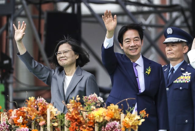 Taiwan's new President Lai Ching-te, right, and former President Tsai Ing-wen wave during Lai's inauguration ceremonies in Taipei, Taiwan on May 20, 2024.