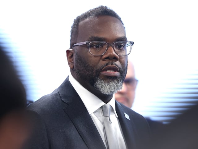 Mayor Brandon Johnson speaks to reporters following a roundtable discussion in Chicago, Thursday, April 4, 2024, with community leaders that elevated the contributions of the Black and brown communities and  urged President Biden to extend work permits to all undocumented workers.  (Antonio Perez/Chicago Tribune)