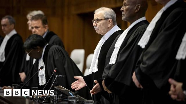 International Court of Justice (ICJ) President Nawaf Salam (C) stands during a ruling over the situation in Rafah, southern Gaza, in the Hague, Netherlands