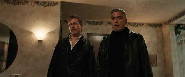 Brad Pitt and George Clooney in “Wolfs.”