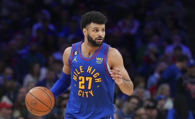 Jamal Murray of the Denver Nuggets dribbles the ball against the Philadelphia 76ers at the Wells Fargo Center on January 28, 2023 in Philadelphia, Pennsylvania.