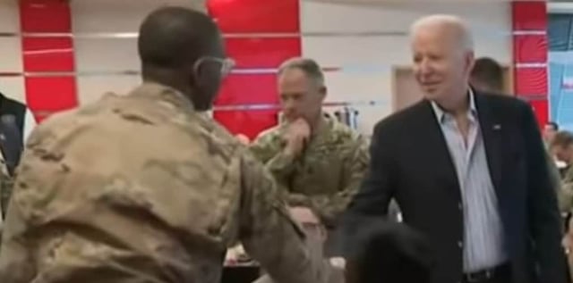 Biden shakes hands with the troops