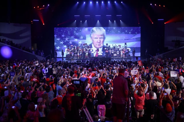 Republican presidential candidate and former U.S. President Donald Trump arrives to deliver a campaign speech during a Turning Point USA event at the Dream City Church in Phoenix on June 6, 2024.