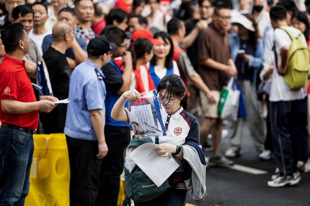 A student enters a school on the first day of the national college entrance examination, known as "Gaokao", in Wuhan, China on June 7, 2024.