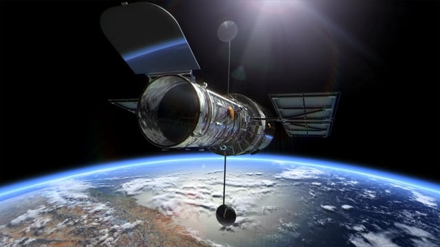 Illustration of the Hubble Space Telescope over the Earth. Credit: ESA/Hubble (M. Kornmesser & L. L. Christensen)