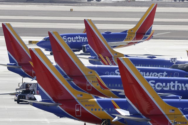 Southwest Airlines Boeing 737 jetliners at gates at Harry Reid International Airport in Las Vegas, Nv., on March 1, 2024.