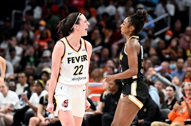 WASHINGTON, DC - JUNE 07: Caitlin Clark #22 of the Indiana Fever celebrates after scoring in the third quarter against the Washington Mystics at Capital One Arena on June 07, 2024 in Washington, DC.