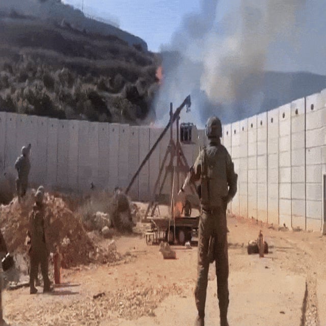 Soldiers on the Lebanese border have been seen shooting fireballs into southern Lebanon.