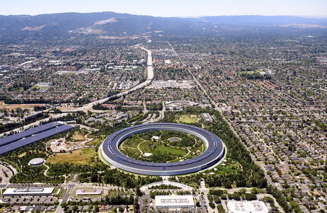 Apple Park, Apple's circular HQ office building, is seen in an aerial view over Cupertino, California on May 16, 2024.