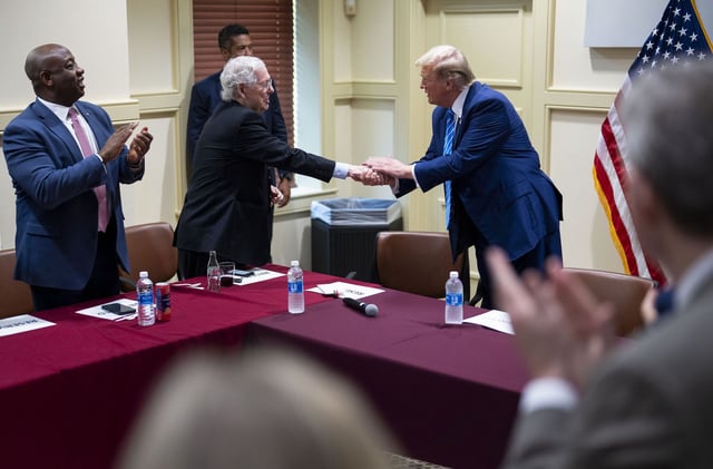 Former President Donald Trump shakes hands with Senate Minority Leader Mitch McConnell (R-Ky.) as he arrives to meet with Republican lawmakers at the National Republican Senatorial Committee headquarters in Washington on Thursday, June 13, 2024. On Thursday, three and a half years after a throng of his supporters fueled by his false claims of a stolen election attacked the Capitol, Trump returned to the nation's capital under much different circumstances -- to flex his dominance over a political and business establishment that has been forced to come to terms with him. (Doug Mills/The New York Times)