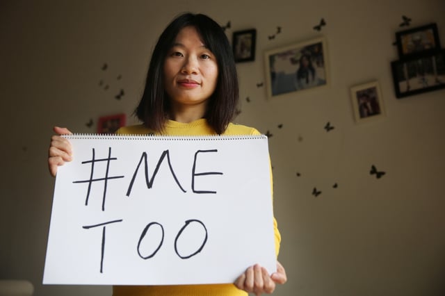 Sophia Huang Xueqin, a freelance journalist who wants to raise peopleé??s awareness on sexual harassment in China, poses with a #MeToo sign at her home. 08DEC17 SCMP/Thomas Yau (Photo by Thomas Yau/South China Morning Post via Getty Images)