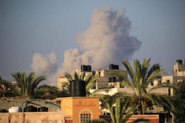 Every time Palestinians pay the price for acting out in some way, their defenders want to rewind history to a more convenient moment—this time to Oct. 6, 2023. Pictured: Smoke billows over the central Gaza Strip town of al-Zawaideh following an Israeli strike south of Gaza City, on June 11. (Photo: EYAD BABA/AFP/Getty Images)