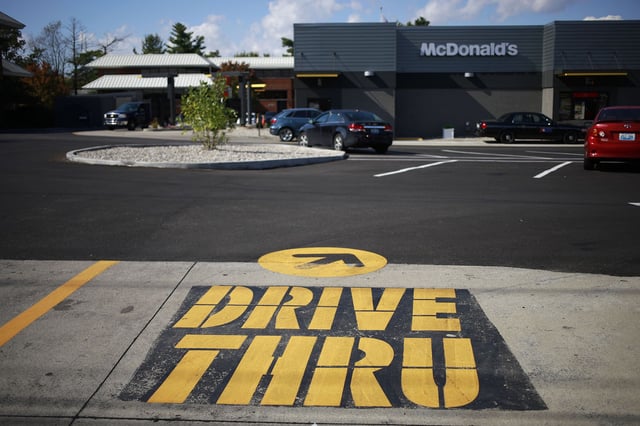 A 'Drive-Thru' lane at a McDonald's Corp. fast food restaurant in Louisville, Kentucky, U.S., on Wednesday, Oct. 20, 2021.
