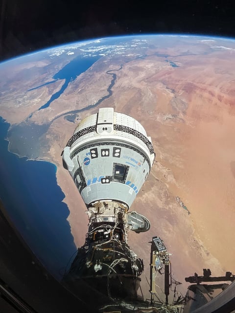 The Starliner spacecraft on NASA's Boeing Crew Flight Test is pictured docked to the Harmony module's forward port as the International Space Station orbited 262 miles above Egypt's Mediterranean coast. Credit: NASA