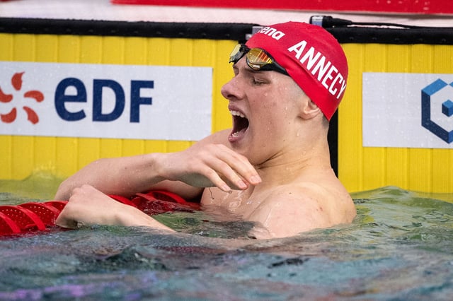 France's Rafael Fente Damers reacts after dislocating his shoulder following the men's 100m freestyle final during the French swimming championships in Chartres, central France, on June 18, 2024, ahead of the Paris 2024 Olympic Games. (Photo by SEBASTIEN BOZON / AFP) (Photo by SEBASTIEN BOZON/AFP via Getty Images)