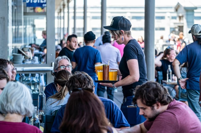 Customers at a restaurant at the Ferry Building in San Francisco on May 31, 2024.