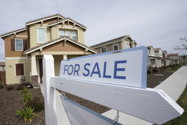 A for sale sign is posted in front of a home in Sacramento, Calif., March 3, 2022. The Biden administration is announcing new federal initiatives to increase access to affordable housing as high interest rates and still-high prices on groceries and other necessities have dramatically pushed up the cost of living in the post-pandemic years. Treasury Secretary Janet Yellen is traveling to Minneapolis on Monday, June 24, 2024, to promote the new investments. (AP Photo/Rich Pedroncelli, File)