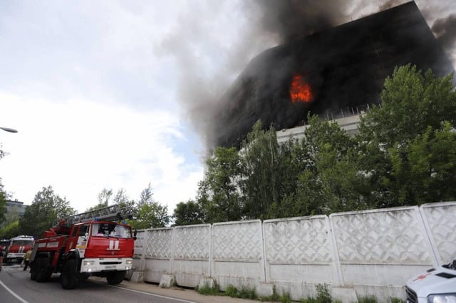 Fire and smoke billow from a burning building in Fryazino, near Moscow, Russia on Monday. Photo: Governor of the Moscow Region Andrei Vorobyov via Telegram / Handout via Reuters