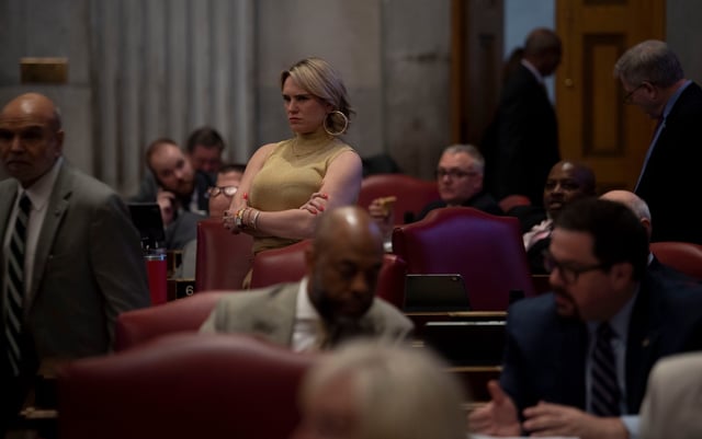 Rep. Aftyn Behn, D- Nashville, looks to Rep. Jason Zachary, R-Knoxville, while he defends SB 1971 during a House session at the Tennessee Capitol in Nashville, Tenn., Tuesday, April 23, 2024.