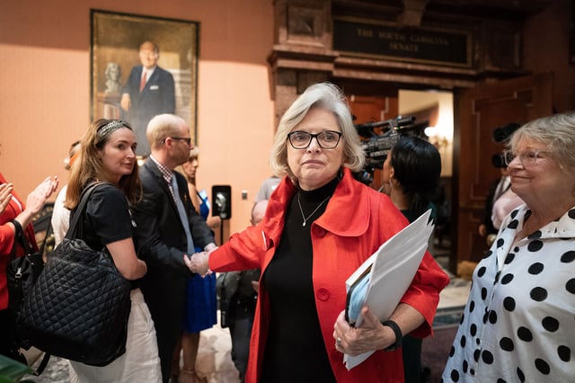 Republican state Sen. Katrina Shealy receives applause from supporters after the Senate passed a ban on abortion after six weeks of pregnancy after a bi-partisan group of five women, including Shealy, led a filibuster that failed to block the legislation, in May 2023.