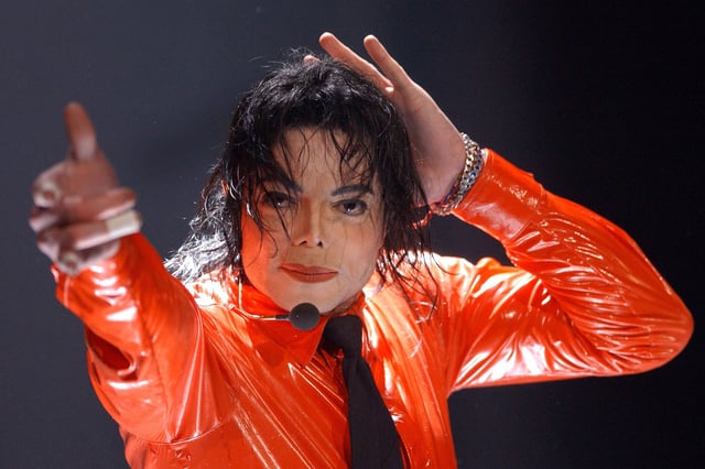 Michael Jackson performs in 2002. 