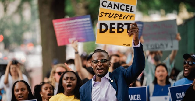 Wisdom Cole, national director of the NAACP Youth and College Division leads a march to the White House over student loan cancellation on June 30, 2023. (Photo: Kent Nishimura, Los Angeles Times via Getty Images)