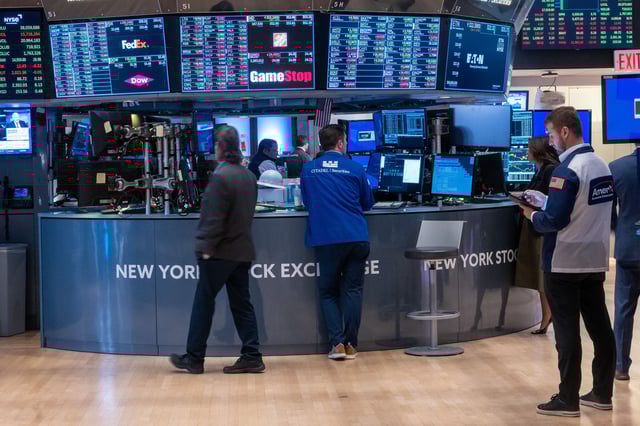 Traders work on the floor of the New York Stock Exchange (NYSE) on June 18, 2024 in New York City.