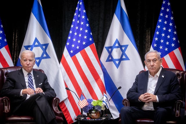President Joe Biden sits with Israeli Prime Minister Benjamin Netanyahu at the start of an Israeli war cabinet meeting, in Tel Aviv, Israel on October 18, 2023.