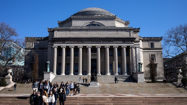 People walk on the Columbia University campus on March 9, 2020 in New York City.