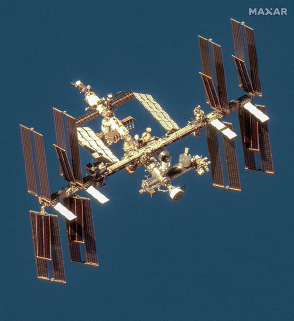 A satellite image shows the International Space Station with the Boeing Starliner spacecraft. Photo: Maxar Technologies